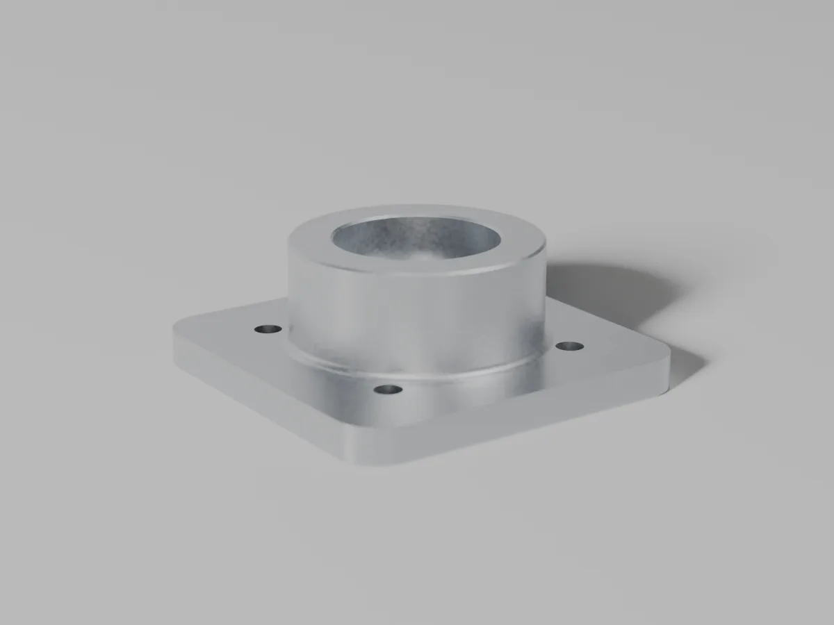 Ein glasperlengestrahltes Lagergehäuse aus Aluminium, mit der Bohrung zur Kamera, auf heller Studiofläche.